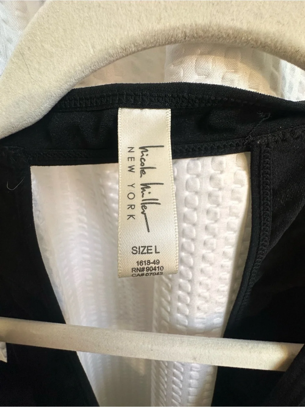 Nicole Miller Black Sleeveless Keyhole Back Body suit.